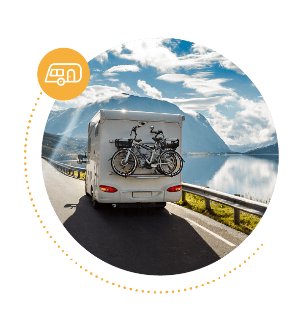 Caravan on a road with a bicycle on the back