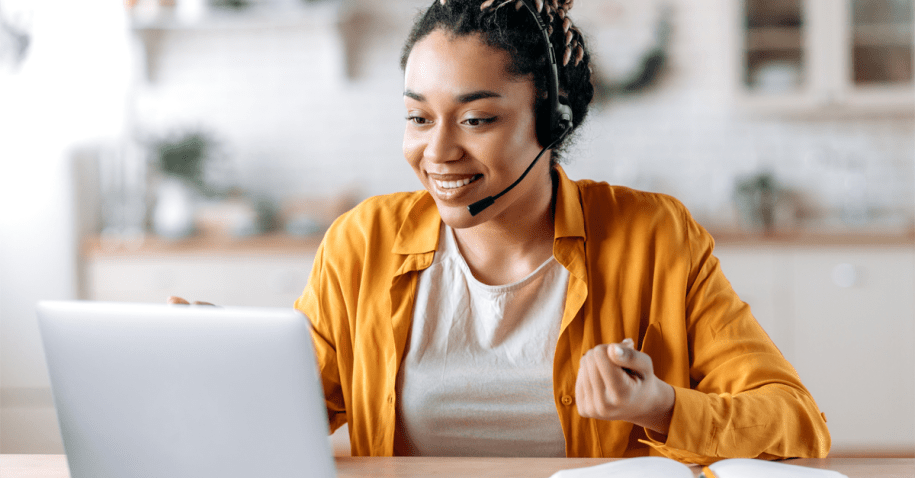 Happy person working with a headset